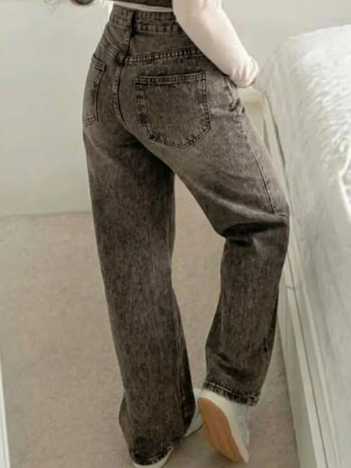 Woman wearing Liana relaxed mid rise straight leg jeans
