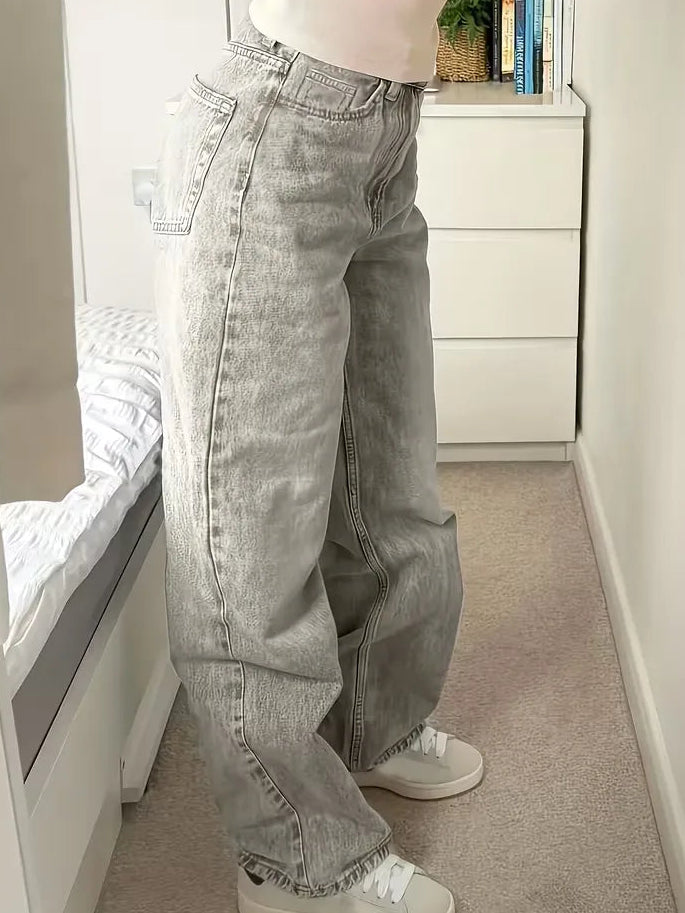 Woman wearing Liana relaxed mid rise straight leg jeans