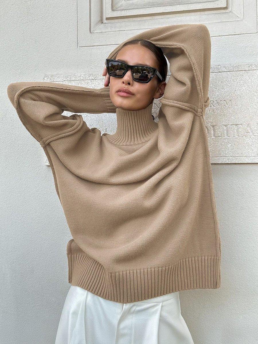 Woman wearing a textured oversized turtleneck sweater