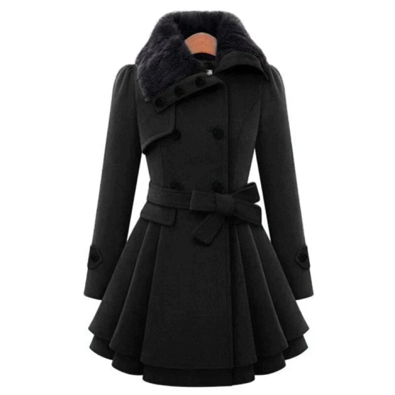 Woman wearing a double-breasted coat with a plush faux fur collar