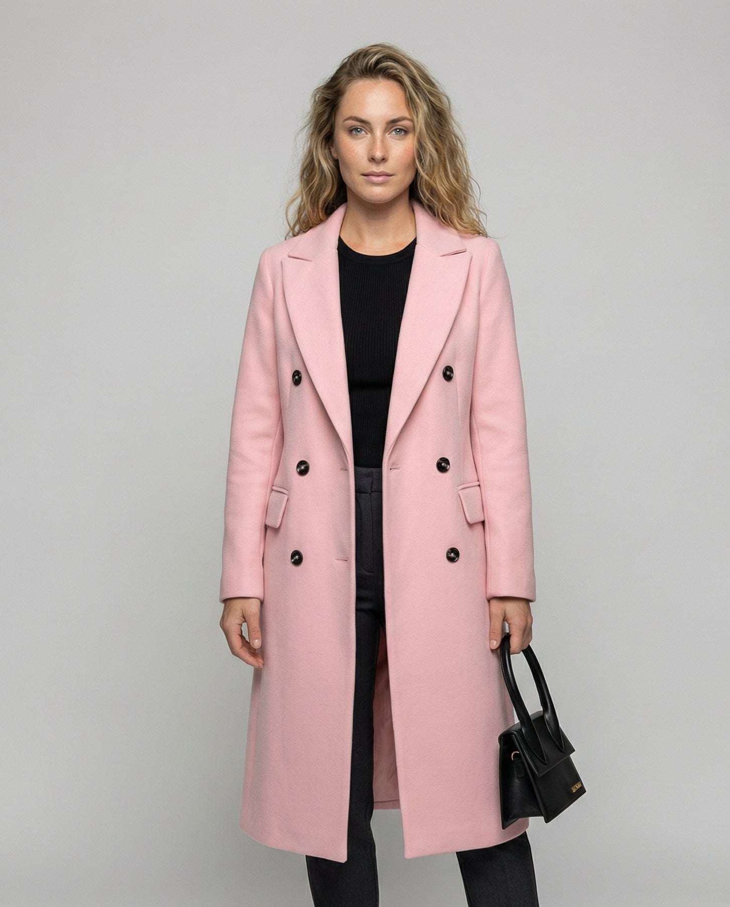 Woman wearing a warm belted trench coat