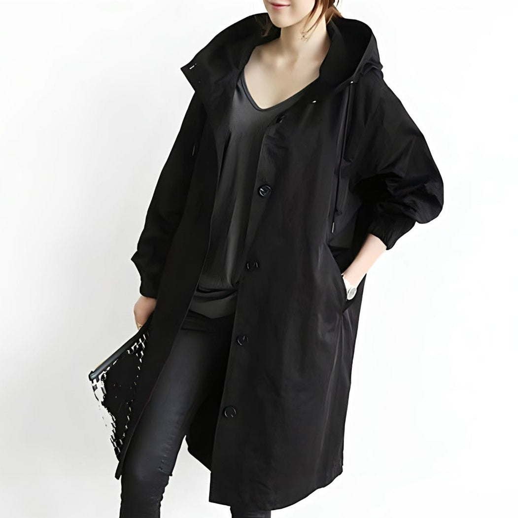 Woman wearing a belted trench coat