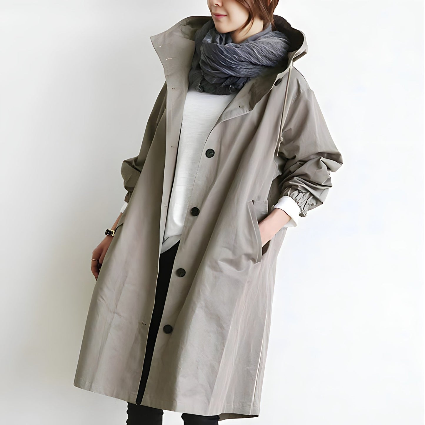 Woman wearing a belted trench coat