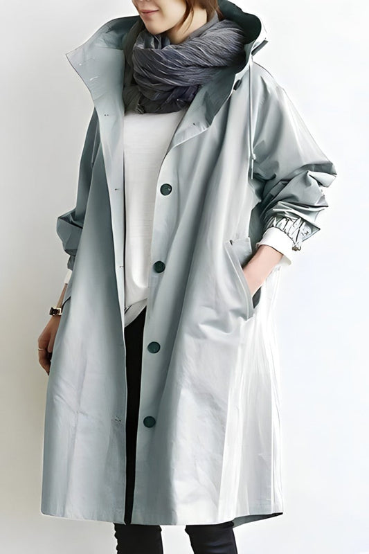 Woman wearing a belted trench coat