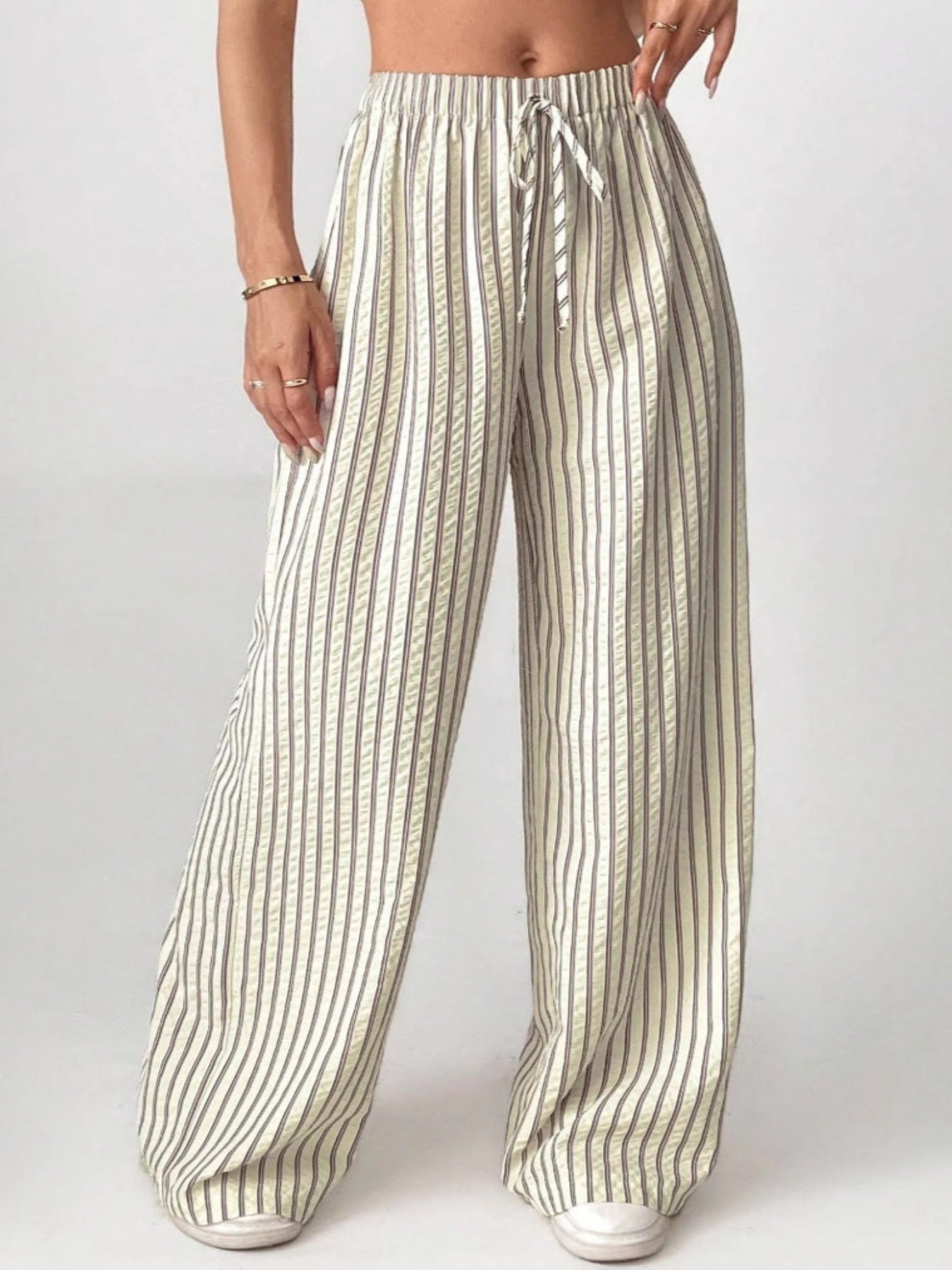 Woman wearing striped relaxed summer pants