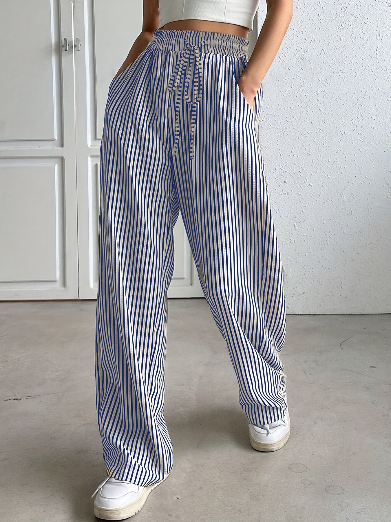 Woman wearing striped relaxed summer pants