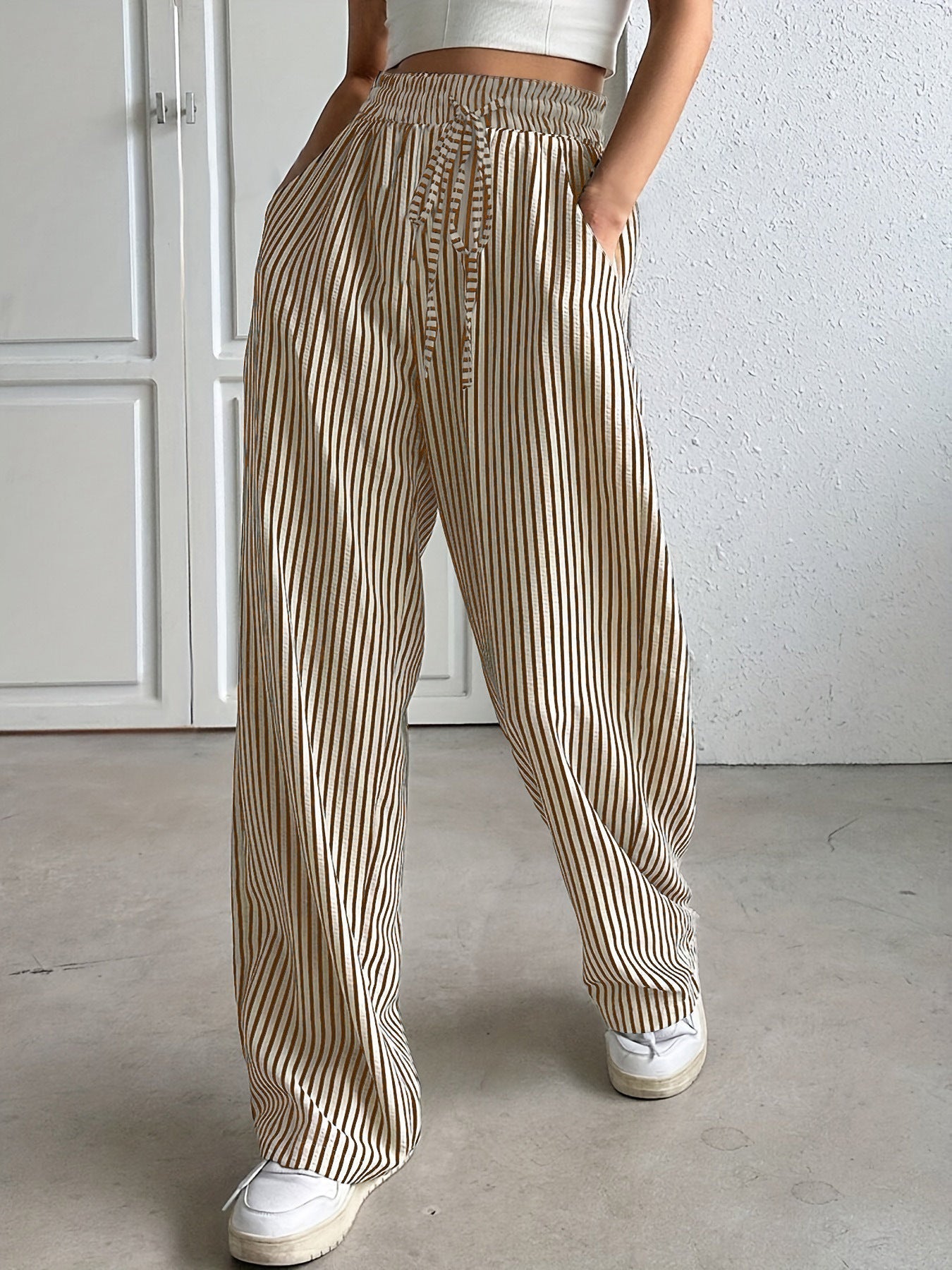 Woman wearing striped relaxed summer pants