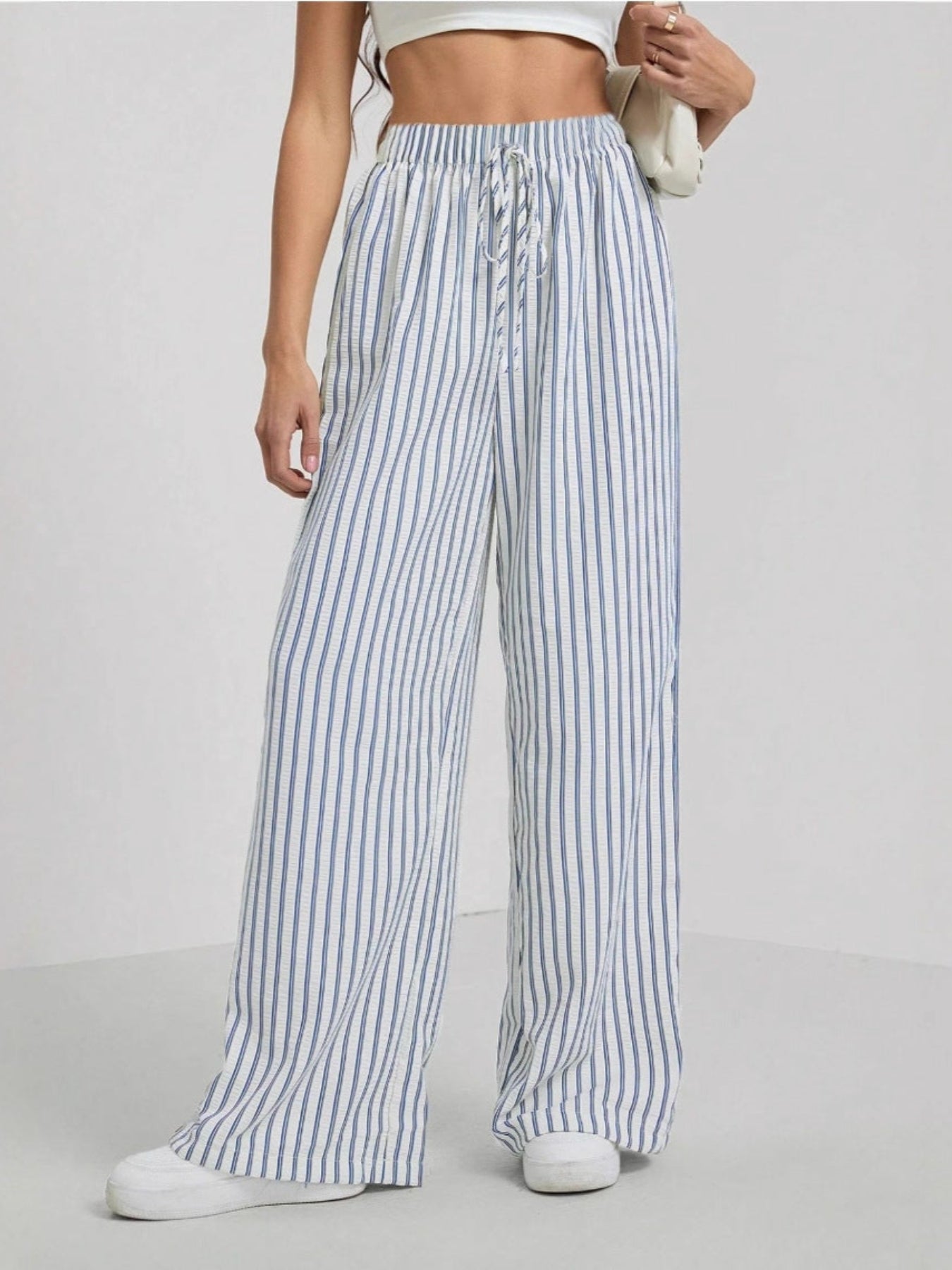 Woman wearing striped relaxed summer pants