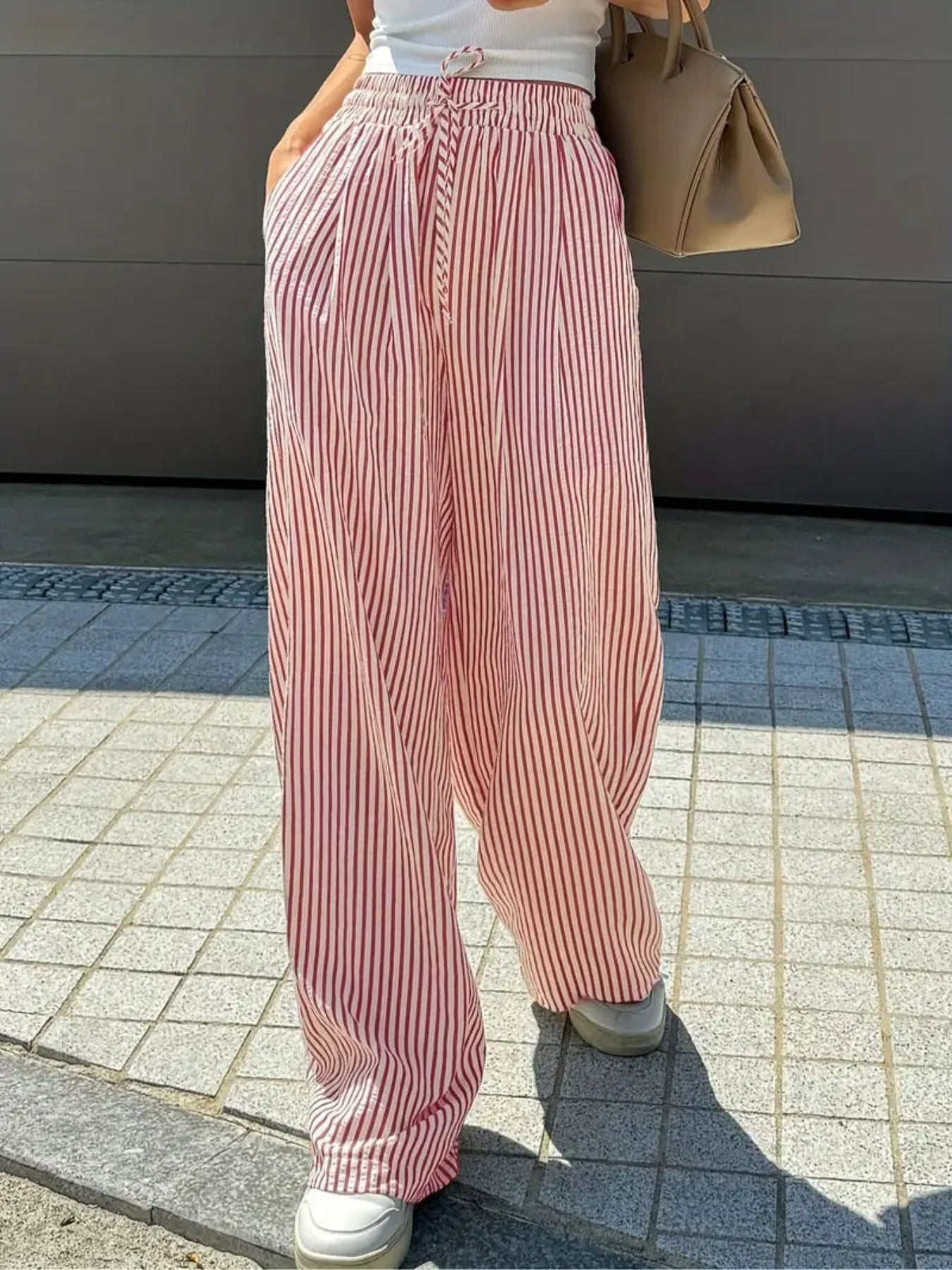 Woman wearing striped relaxed summer pants