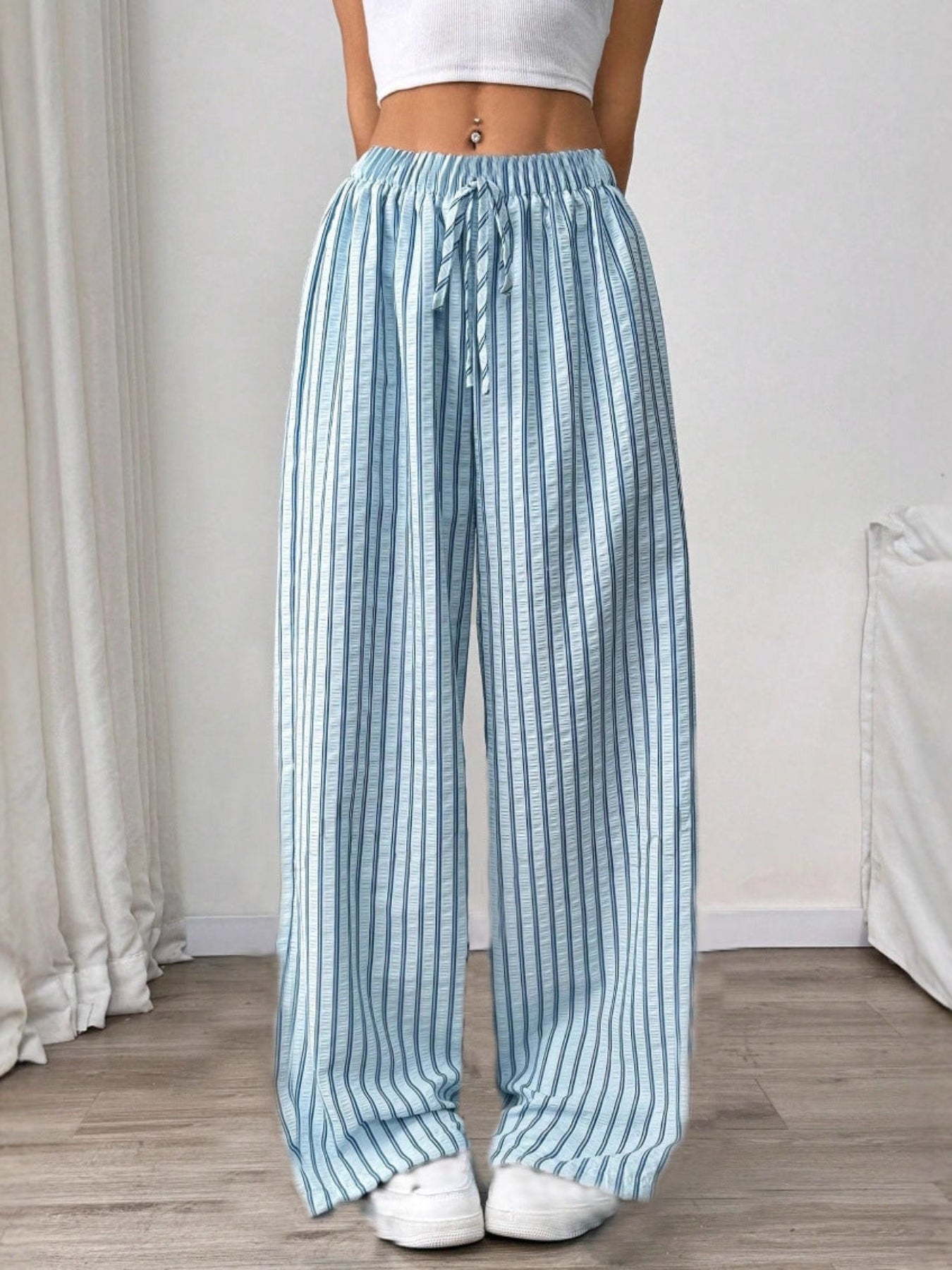 Woman wearing striped relaxed summer pants