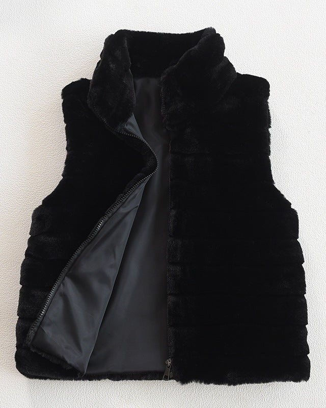 Woman wearing a faux fur quilted vest