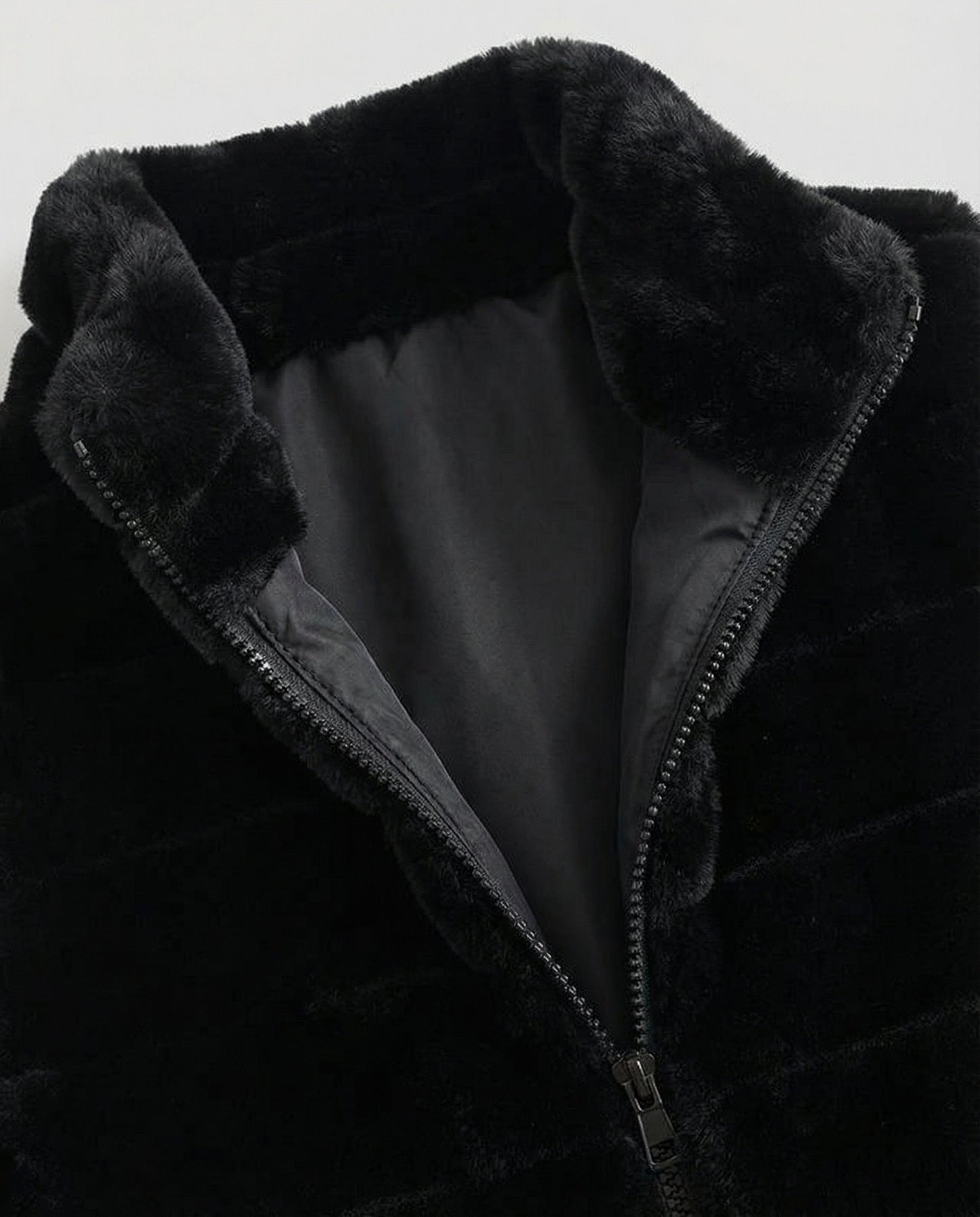 Woman wearing a faux fur quilted vest