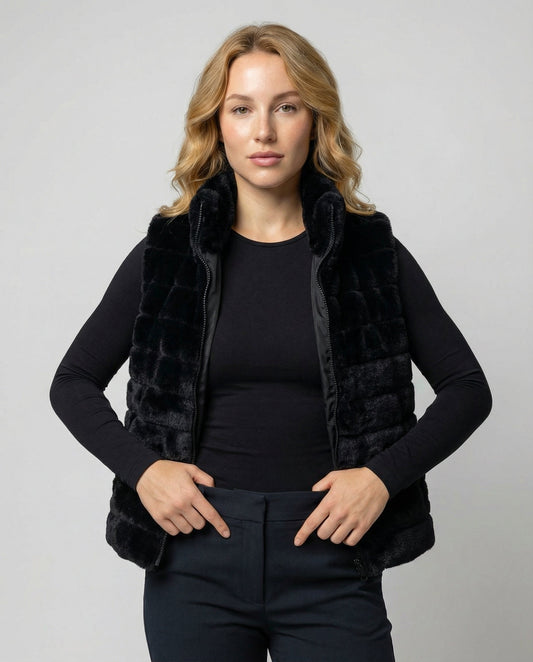 Woman wearing a faux fur quilted vest