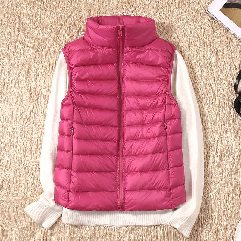 Fuchsia lightweight quilted vest for women.