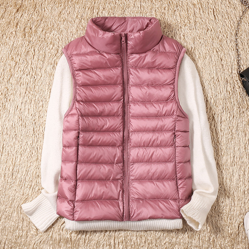 Pink lightweight quilted vest for women.