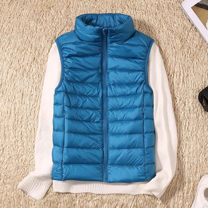 Teal lightweight quilted vest for women.