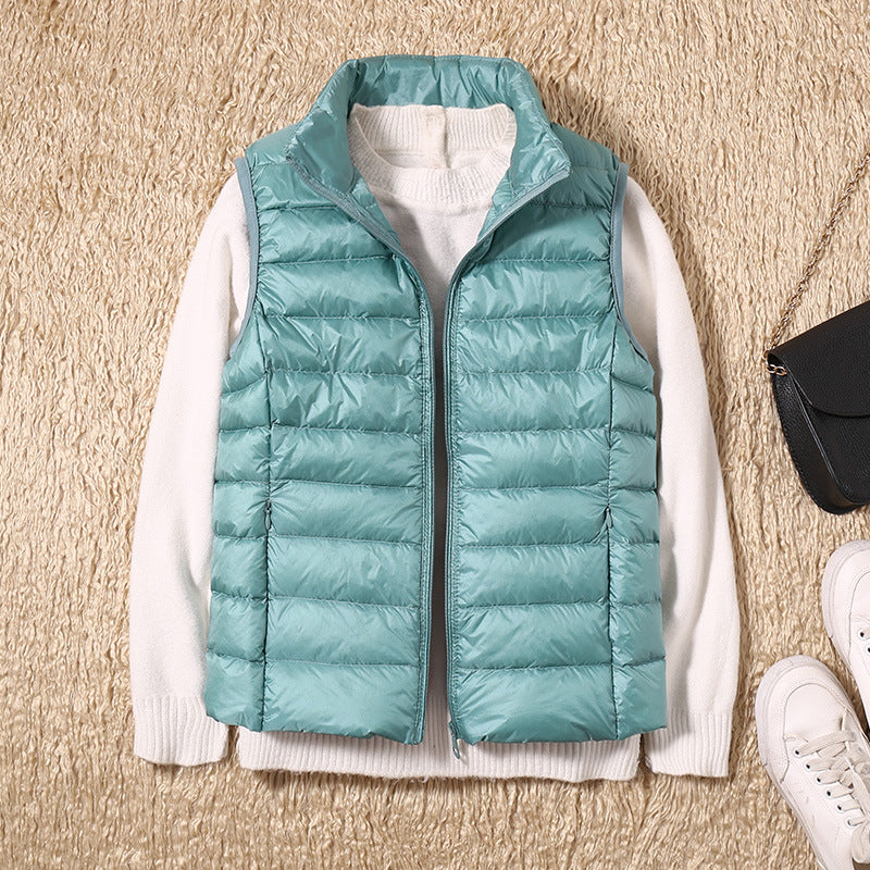 Turquoise lightweight quilted vest for women.