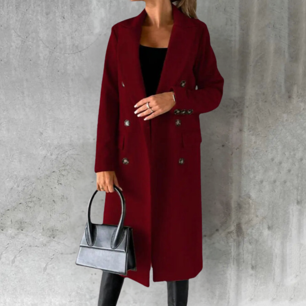 Woman wearing a longline double-breasted overcoat with notched lapel