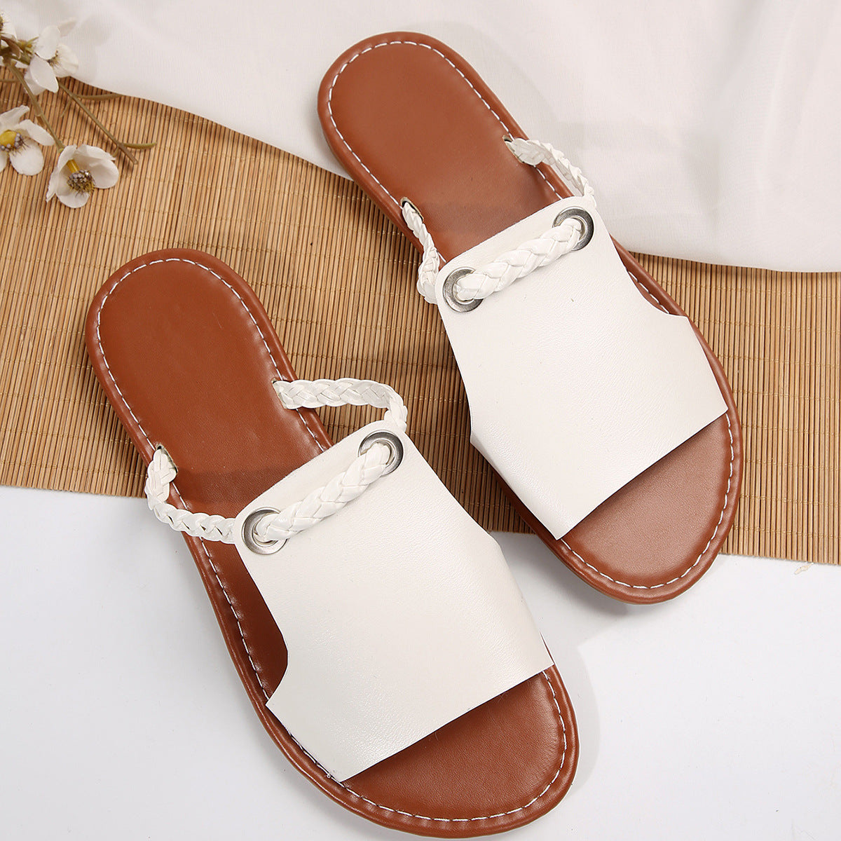 Women's braided toe flat slide sandals