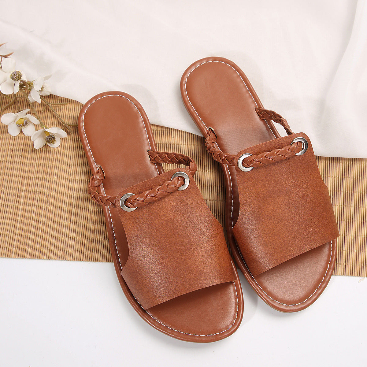 Women's braided toe flat slide sandals