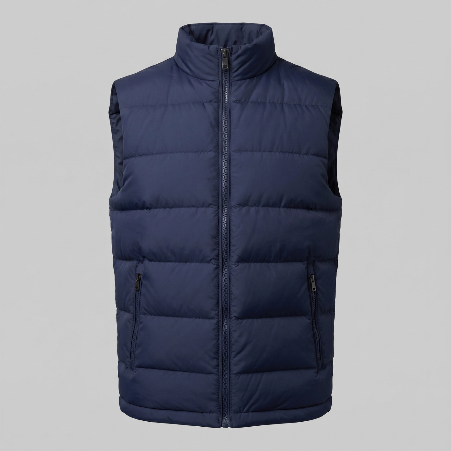 Man wearing a men's quilted puffer vest with a stand collar and full zip front