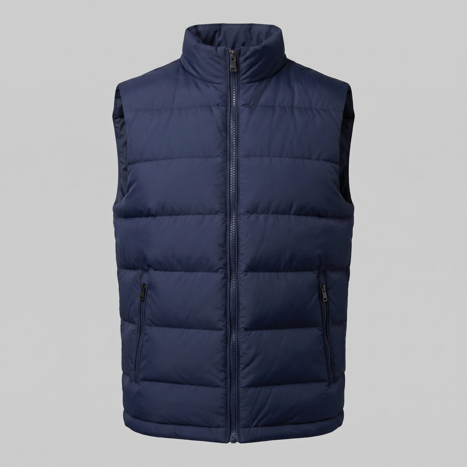 Man wearing a men's quilted puffer vest with a stand collar and full zip front
