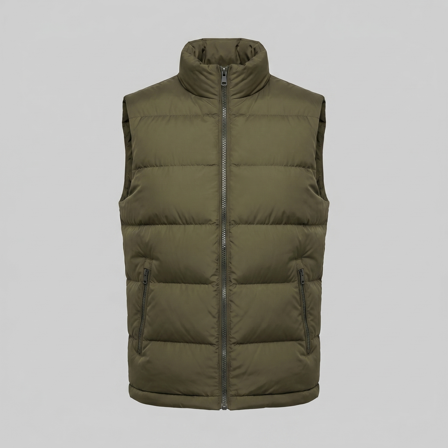 Man wearing a men's quilted puffer vest with a stand collar and full zip front