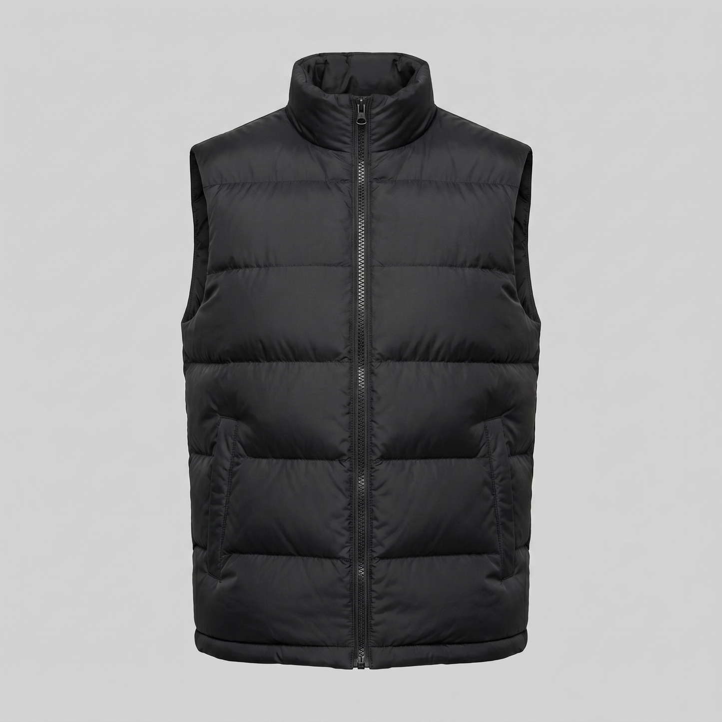 Man wearing a men's quilted puffer vest with a stand collar and full zip front