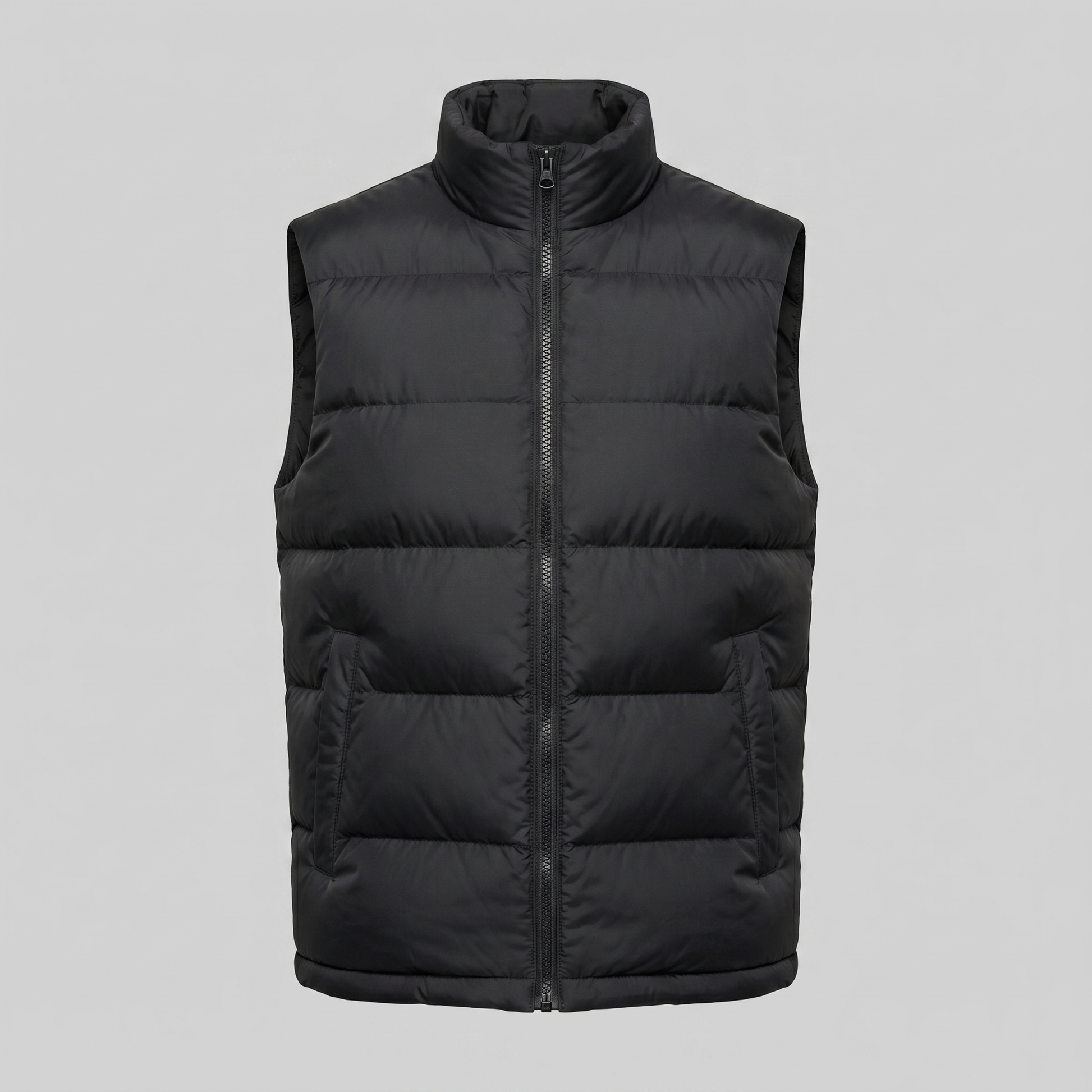 Man wearing a men's quilted puffer vest with a stand collar and full zip front