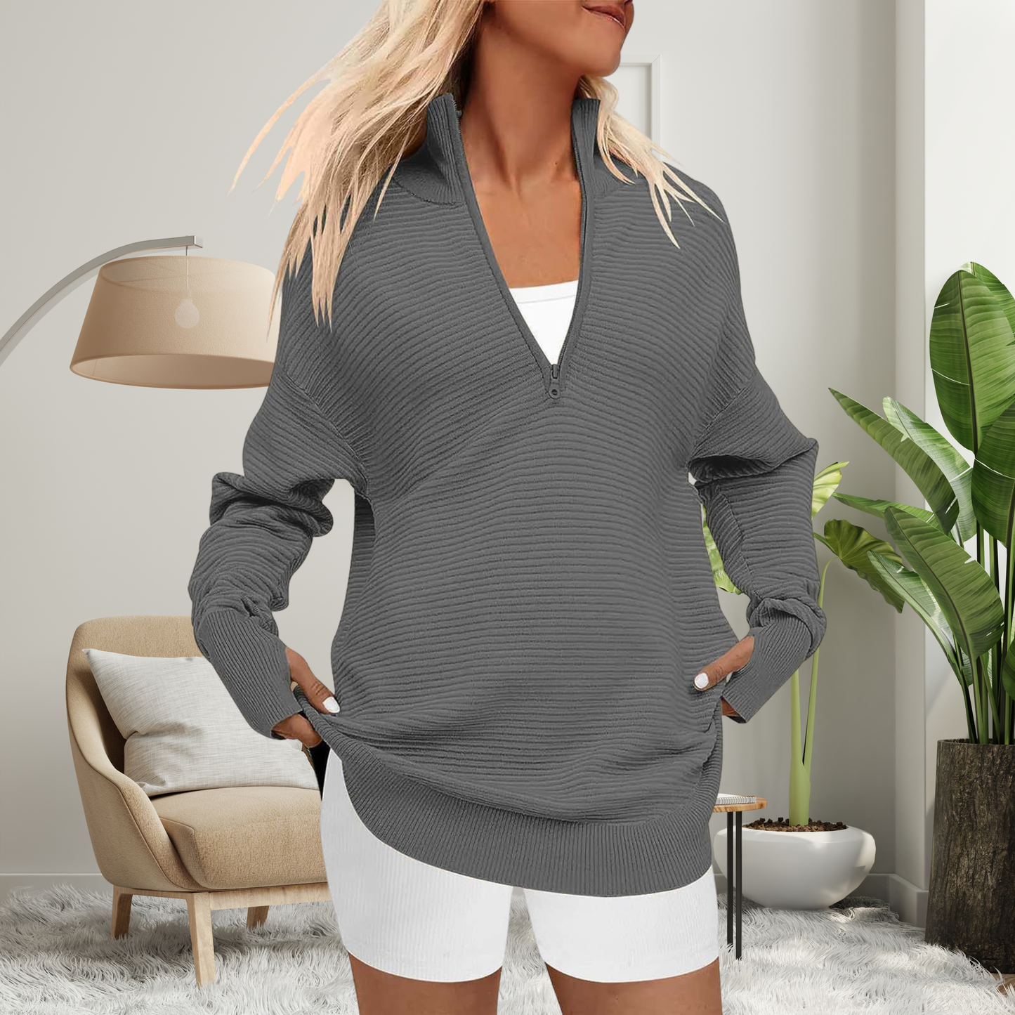 Woman wearing a quarter zip collared pullover sweater