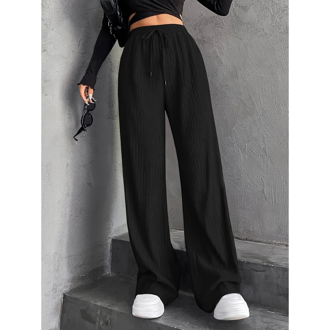 Woman wearing wide waist everyday comfort pants