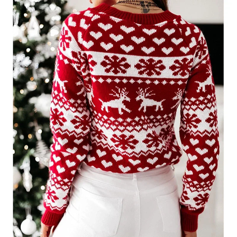 Woman wearing a reindeer snowflake knit Christmas sweater