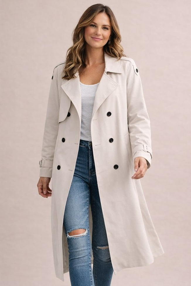 Women's double breasted belted longline trench coat with notched lapels