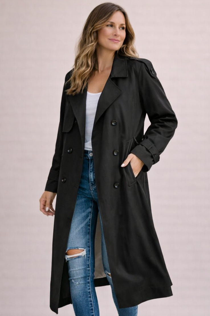 Women's double breasted belted longline trench coat with notched lapels