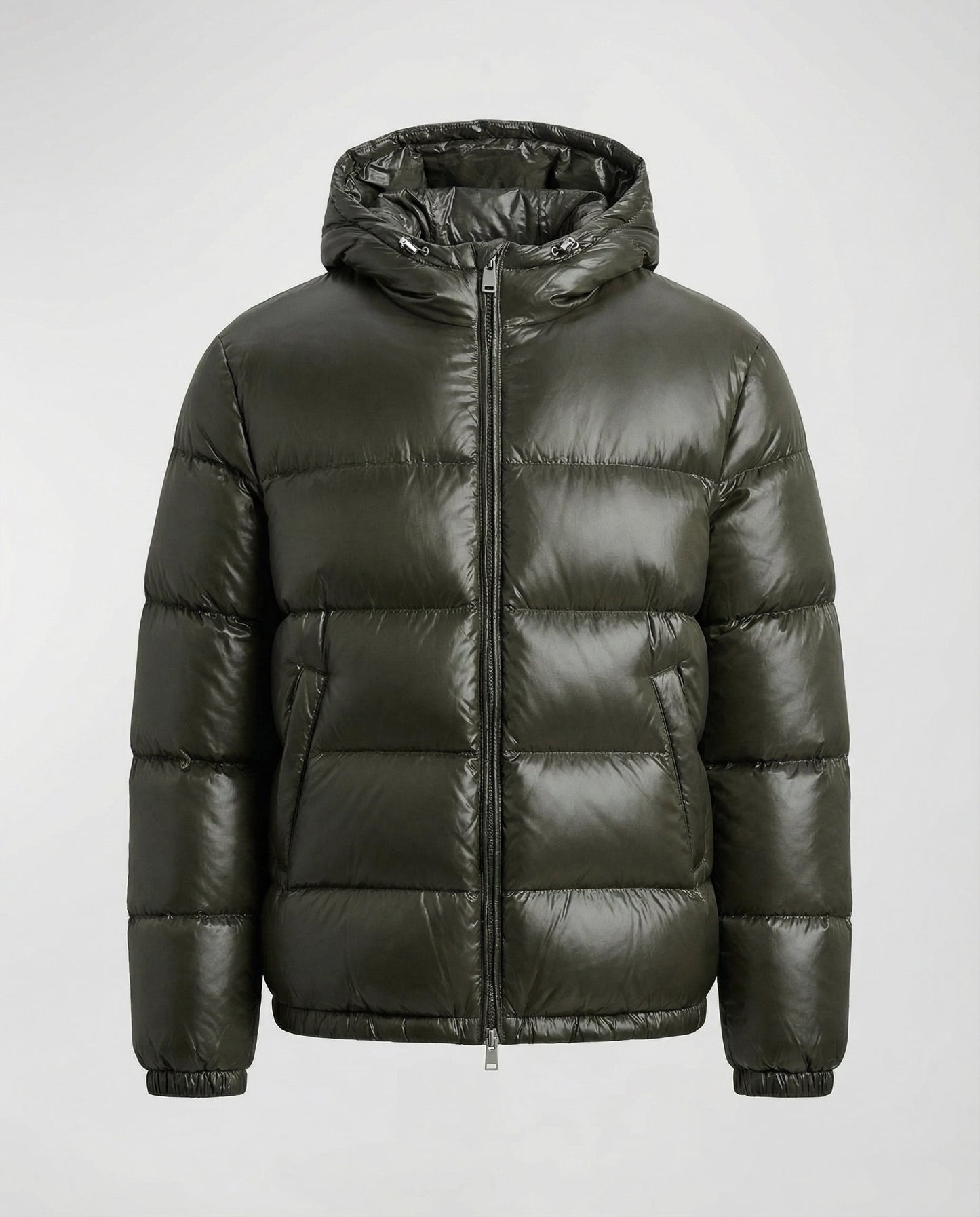 Person wearing a hooded quilted unisex puffer jacket