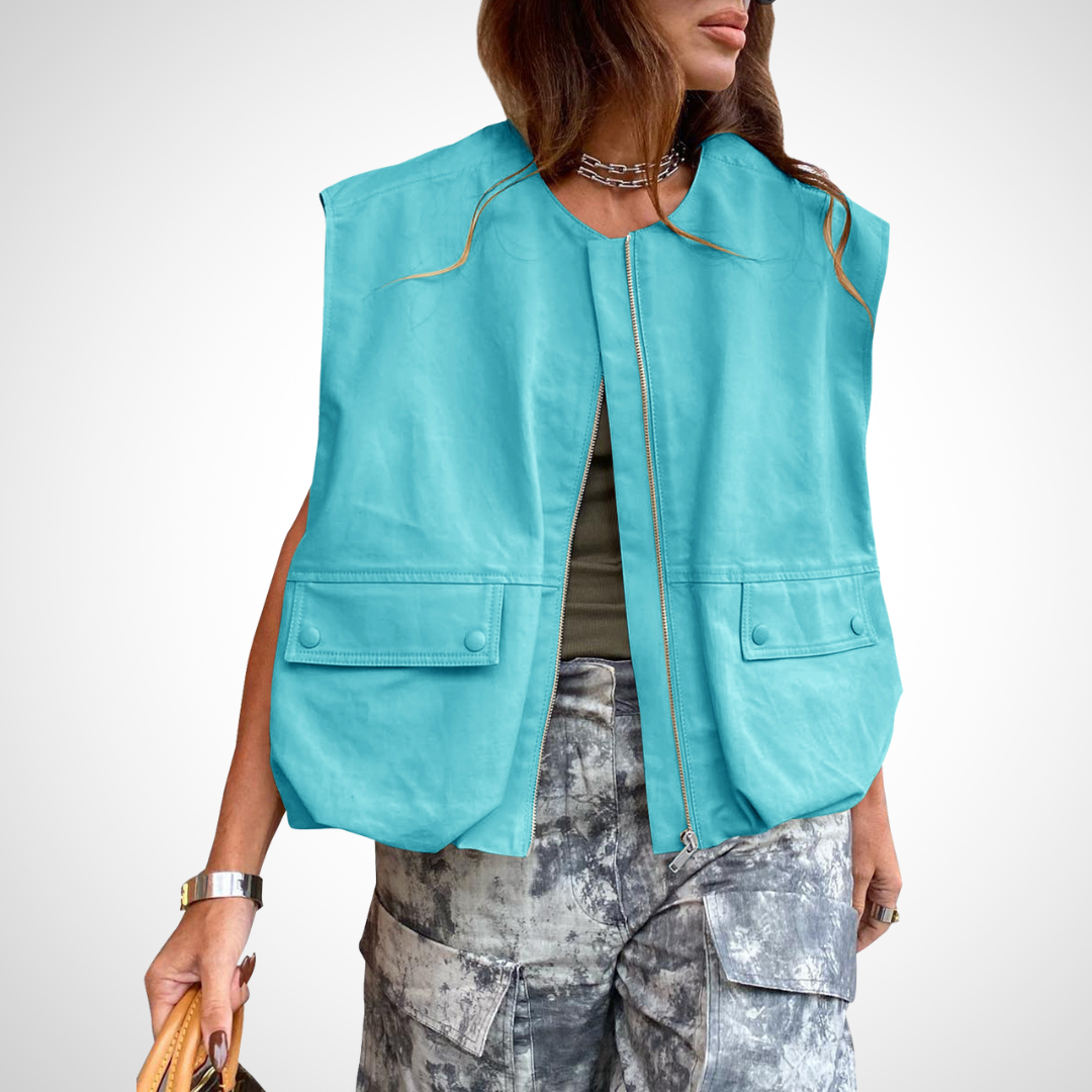 Turquoise zip front vest for women.