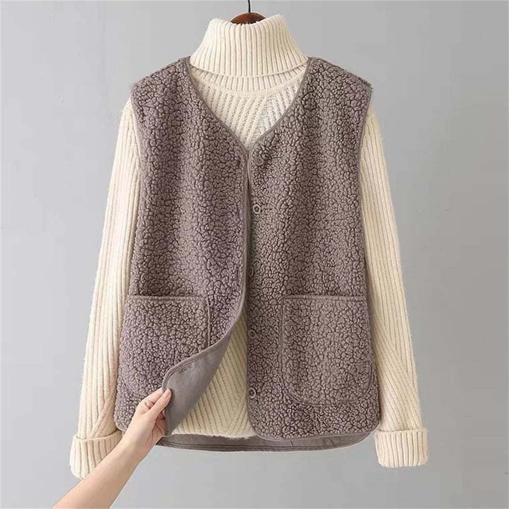 Taupe fleece vest for women.