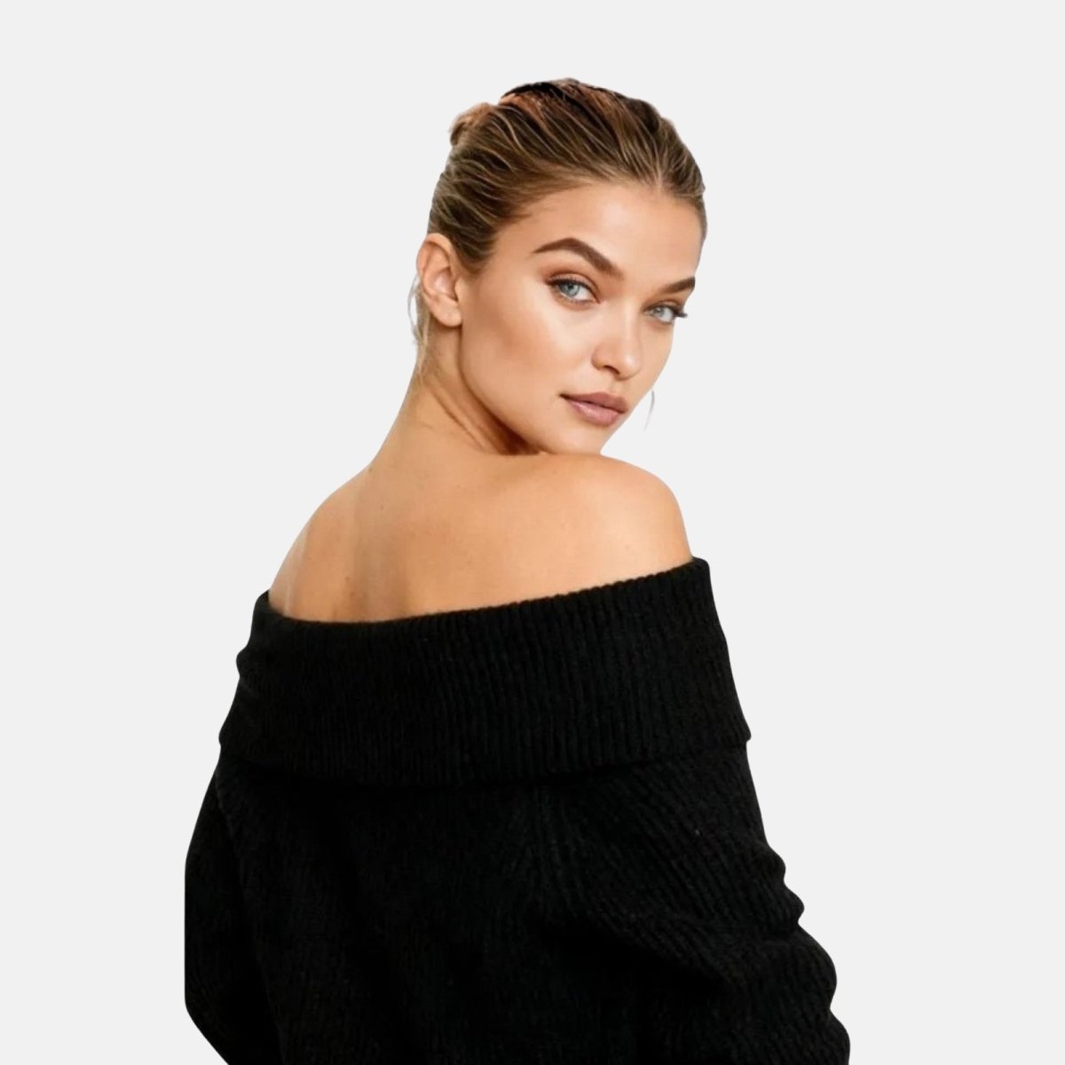 Woman wearing a black off shoulder oversized ribbed knit sweater