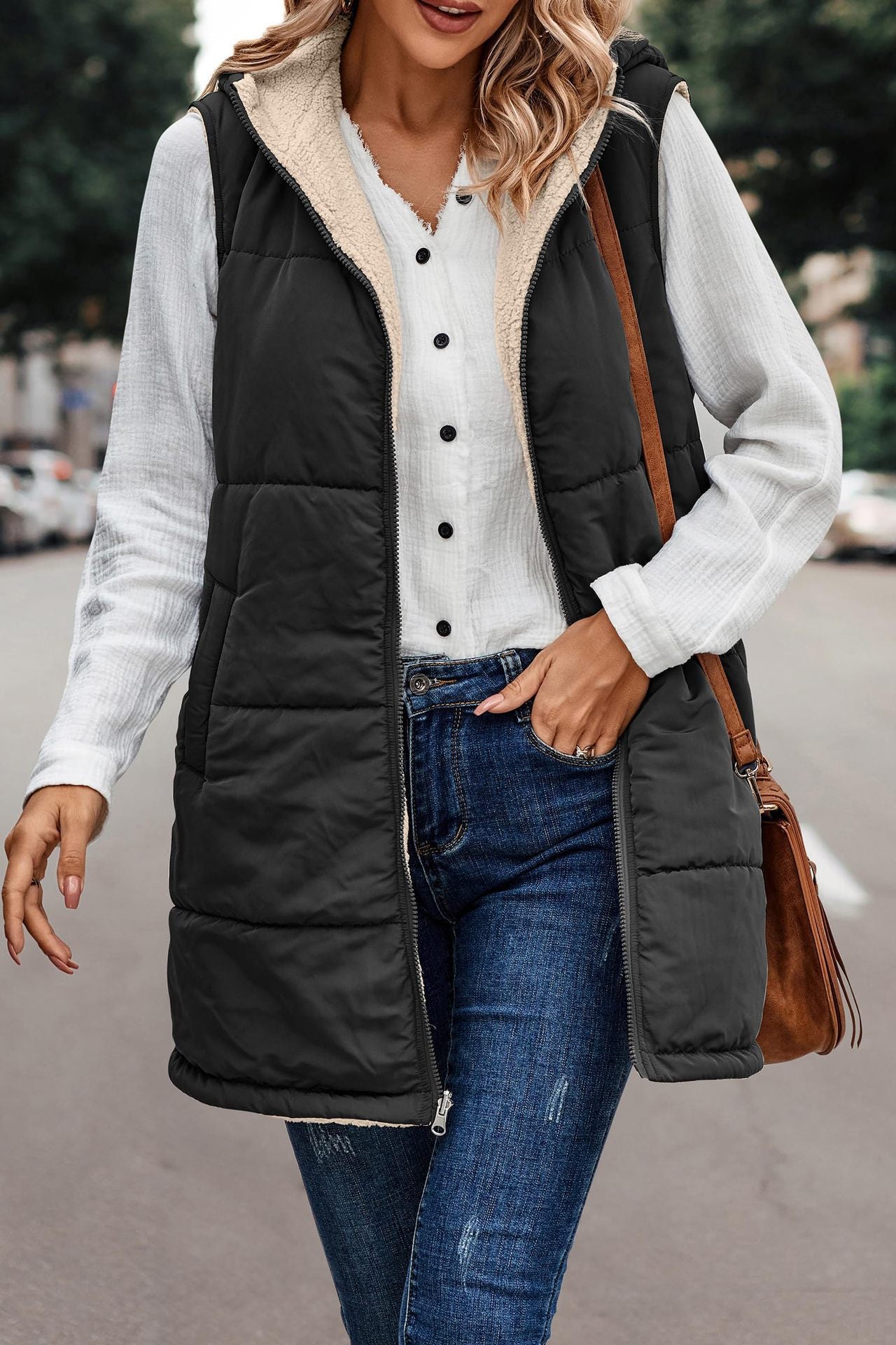 Black reversible hooded vest for women.