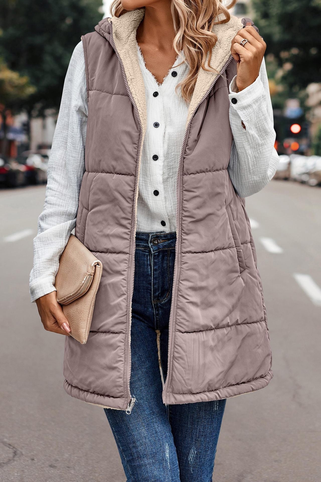 Mauve reversible hooded vest for women.
