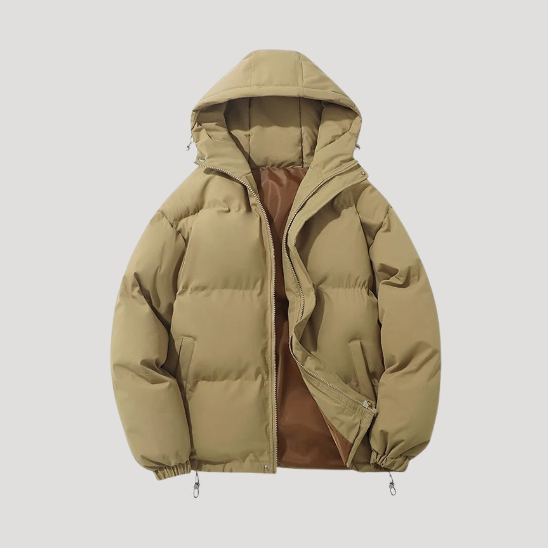 Woman wearing an insulated hooded quilted puffer coat