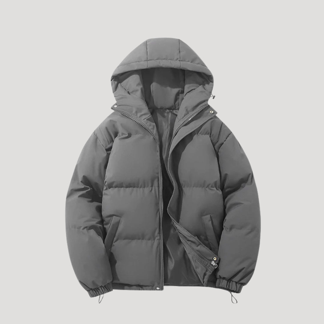 Woman wearing an insulated hooded quilted puffer coat