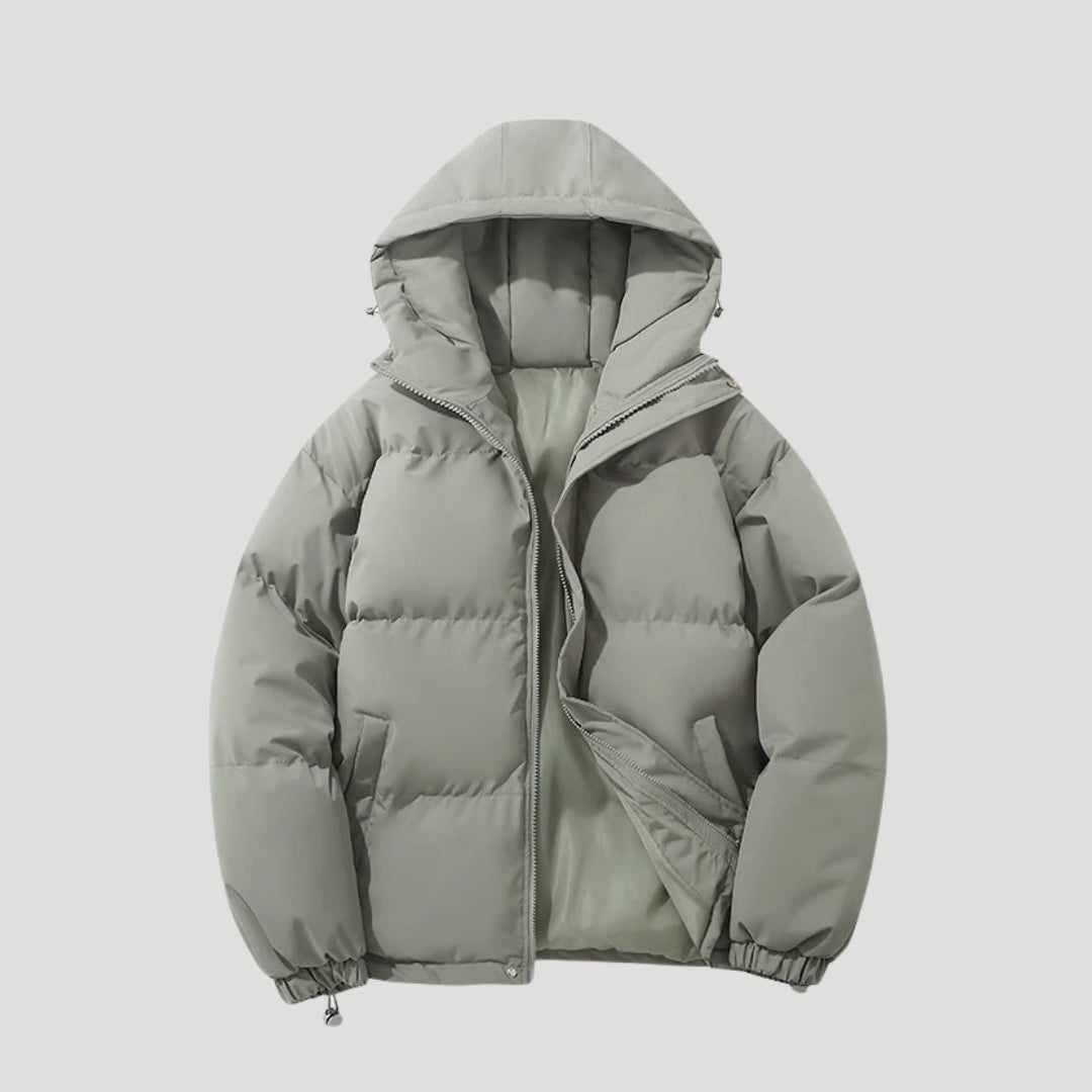 Woman wearing an insulated hooded quilted puffer coat