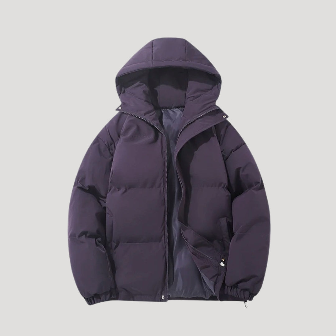 Woman wearing an insulated hooded quilted puffer coat