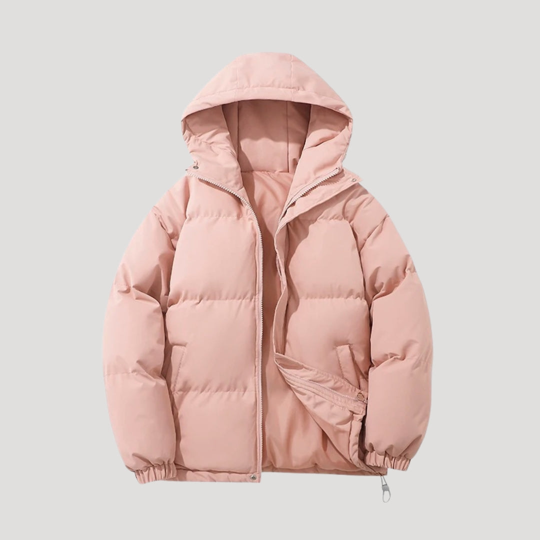 Woman wearing an insulated hooded quilted puffer coat