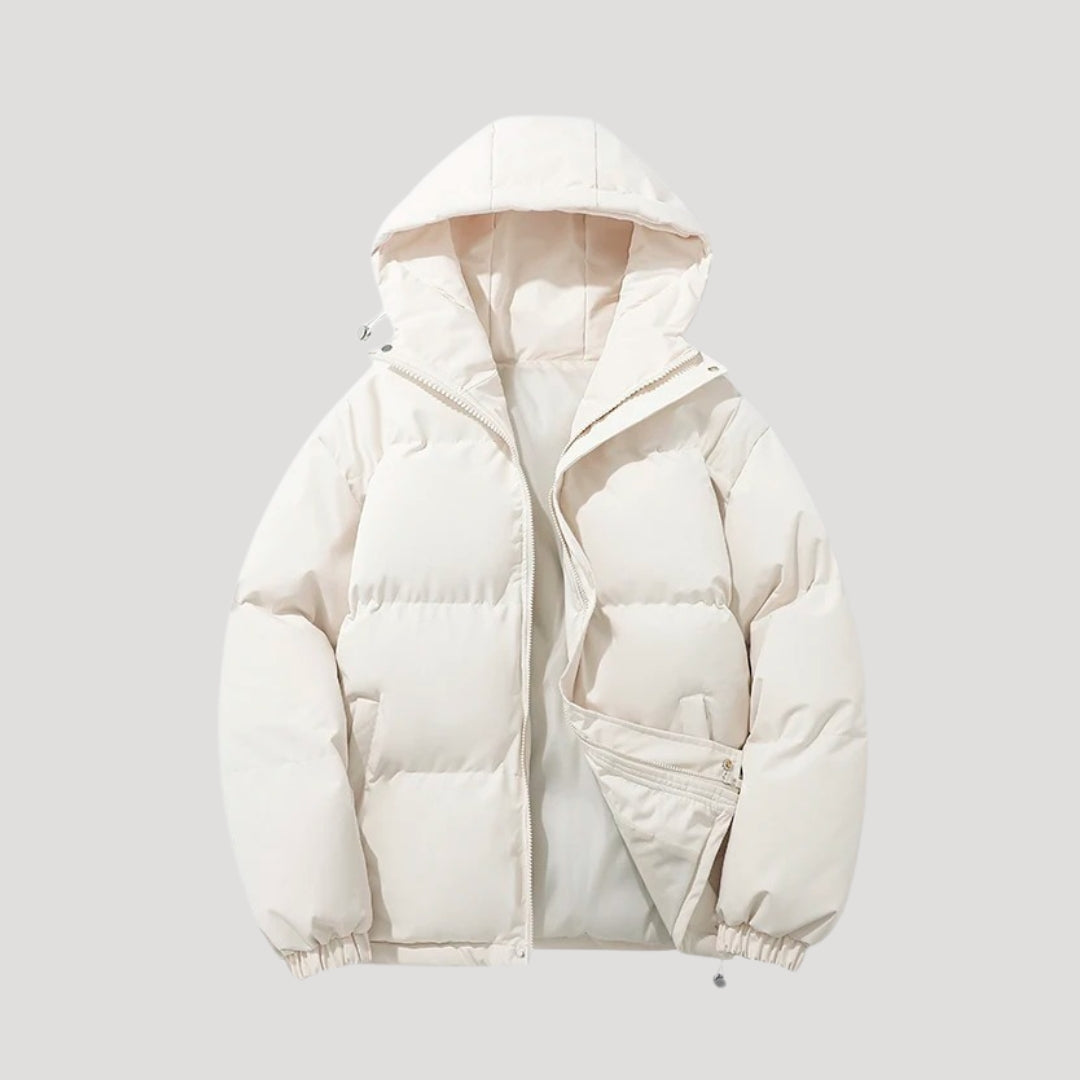 Woman wearing an insulated hooded quilted puffer coat