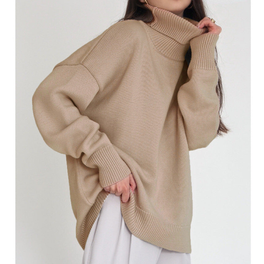 Woman wearing an oversized turtleneck knit sweater
