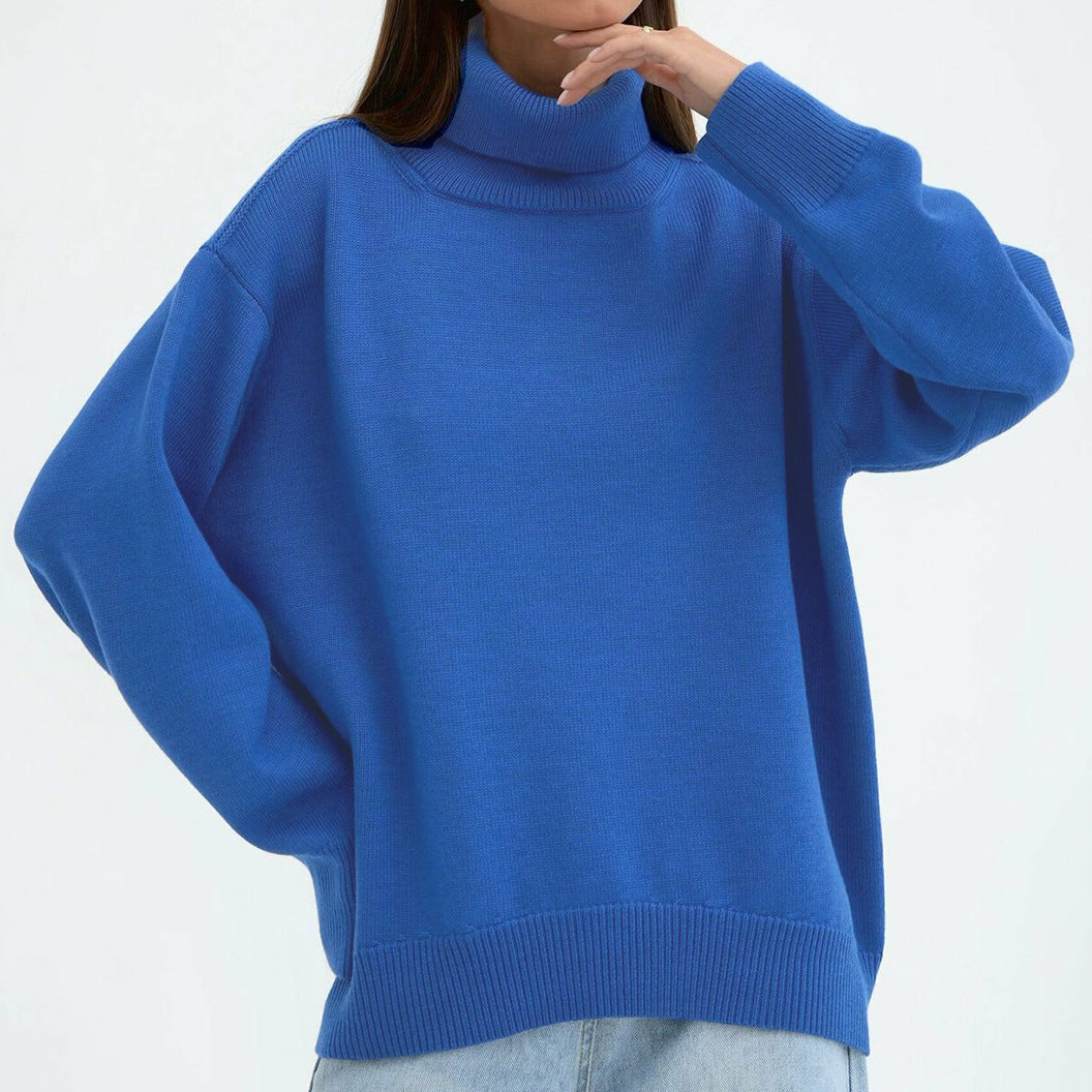 Woman wearing an oversized turtleneck knit sweater