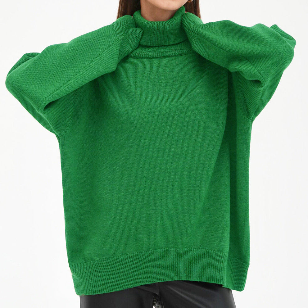 Woman wearing an oversized turtleneck knit sweater