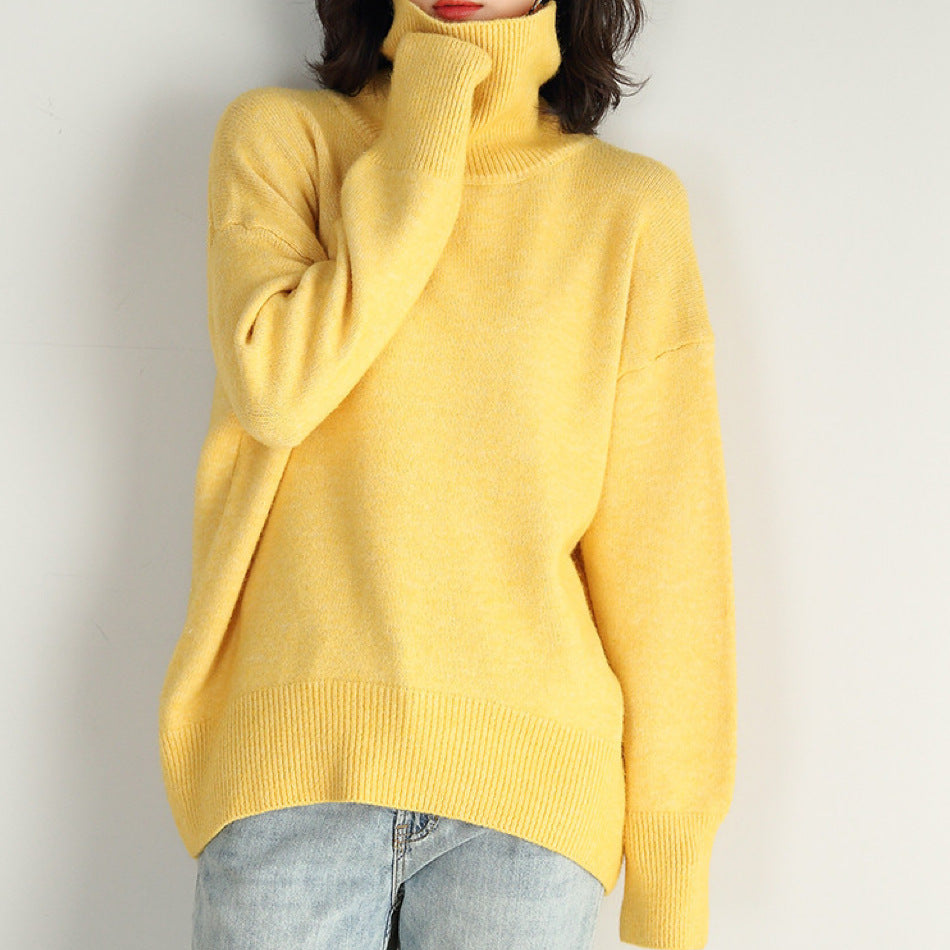 Woman wearing an oversized turtleneck knit sweater